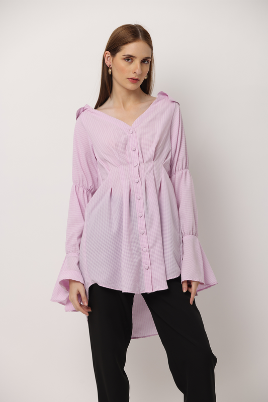 Introducing Ferlyy’s stunning drop-collared, broad-neck shirt. From stunning front pleats and high-low front and back, this graceful shirt also has full sleeves with bow tie details. Ensuring a perfect fit with front pleats, this gingham textured long shirt comes in a graceful lavender. Unlined.