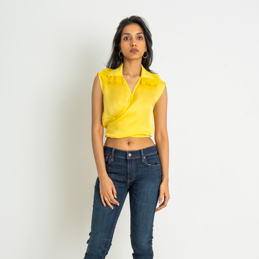 This back tie detail cross over top is a very versatile piece, you can tie it in the front or back as you like it! It’s statement collar adds a touch of drama to your entire outfit! Pair with a signature clutch and pair of denims to be a head turner anywhere!