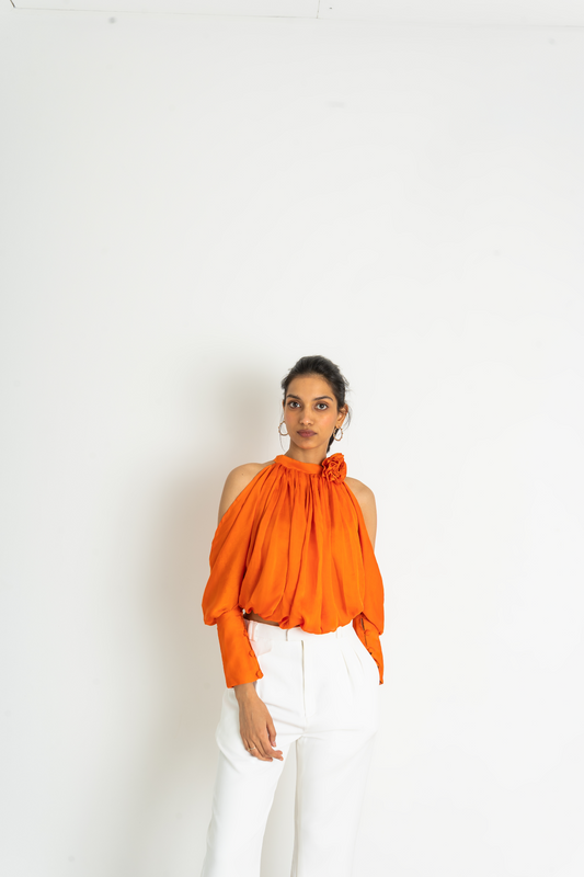 Our absolute favourite this satin flower detailed, cold shoulder top is just simplicity at its best! Say out loud #OrangeIsTheNewBlack for your next gal pal brunch or an evening out with best friends with Ferlyy’s signature orange top.