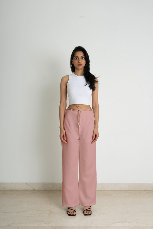 Wide legged trousers in knitted fabric. High waist with a zip fly and a concealed button and hook-and-eye fastener. Diagonal side pockets, and wide, straight legs with drawstrings attached to the belt for added comfort in a light hued pink